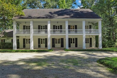 Welcome home to this old world Plantation style ho
