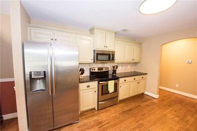 Kitchen with stainless steel appliances - Refriger