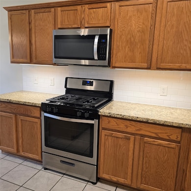 This kitchen features modern stainless steel appli
