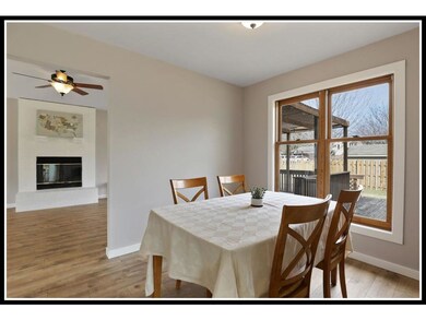 Separate formal dining room looks out to backyard
