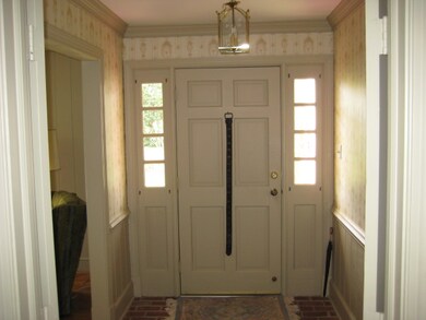 Entrance Foyer and brick floor