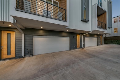 Front of property with private 2 car garage