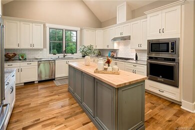 Lovely, wooded views form the kitchen window. Invi