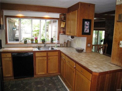 Kitchen.  Breakfast bar is to the right.