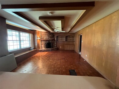 View of den from kitchen.