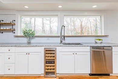 KITCHEN W/ 2 LARGE PICTURE WINDOWS, SS APPLIANCES,