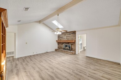 Living room featuring wood finished floors, a ceil