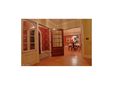 Inviting entryway with hardwood floors