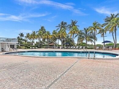Pool and cabanas steps above ocean