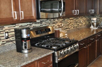 Gourment Kitchen w/ Tile Back Splash