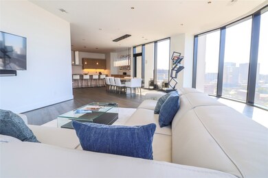 Amazing open concept kitchen and living area.