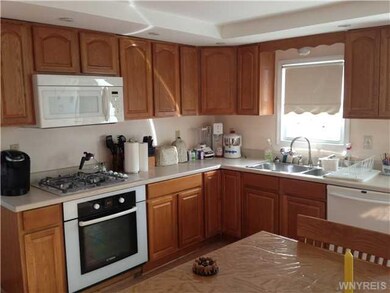 Kitchen kitchen with loads of cabinets, comes with all appliances in this kitchen, ceramic tile flooring, Bosch stove