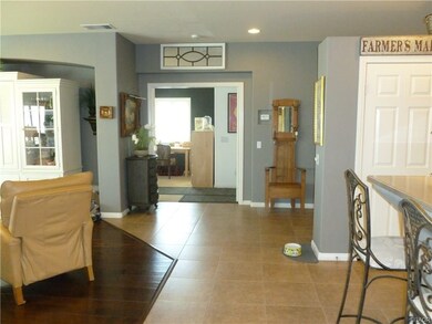 GREAT ROOM LOOKING TOWARD DOUBLE DOORS TO MASTER S