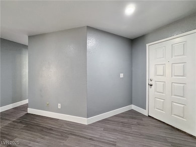 Entrance foyer with dark wood finished floors and