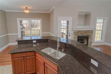 Kitchen with Eat-In space & Bar that opens to LR. 