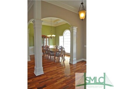 Dining Room. Dining room features tray ceiling, ha