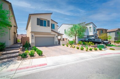 View of front of house with a garage, stucco siding, decorative driveway, a residential view, and a gate