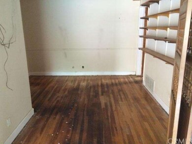 BEDROOM THAT WAS USED AS A DEN OPENS TO THE LARGE 