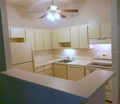 3259 Fox Chase Cir N unit 208, Palm Harbor, FL 34683 - photo 6