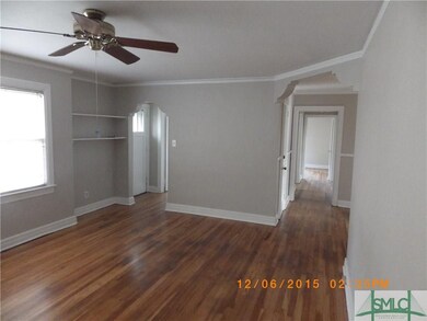 LIVING ROOM ENTRY TO LEFT, HALL TO RIGHT