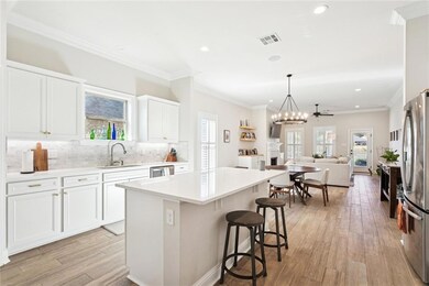 View of the spacious kitchen and living area from the foyer.