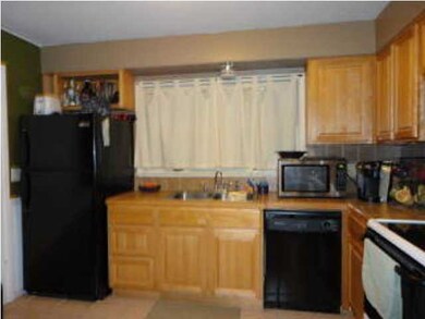 Kitchen stove and refrigerator stay.