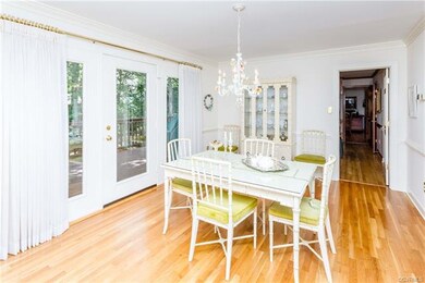 Dining Room with hardwood floors and entrance onto