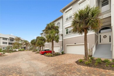 View of property with double garage