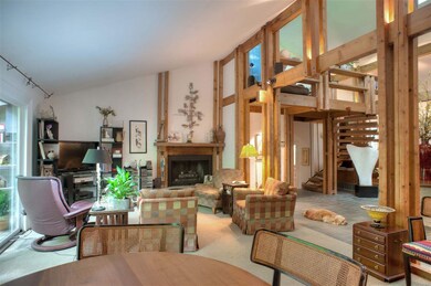 23x13 DEN features Gas Log Fireplace and vaulted ceiling, plus wall of double pane windows overlooking gorgeous rear grounds.