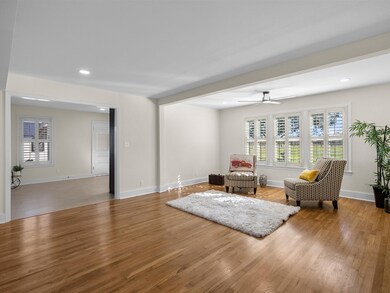 The expansive living room looks out onto the huge