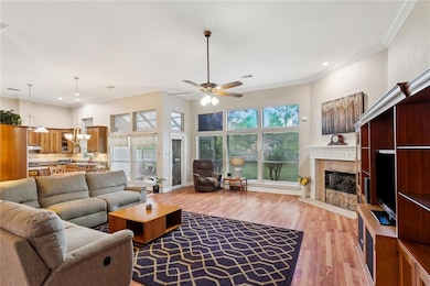 Huge Den features gas fireplace with gas logs.
