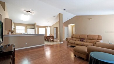 Living room into Kitchen and Dining