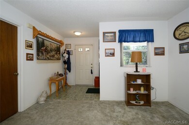 Foyer Entry To Open Dining & Living Areas