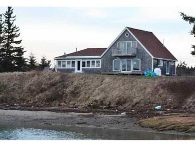 Exterior Front. Shoreline of...