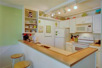 Raised bar with additional seating.