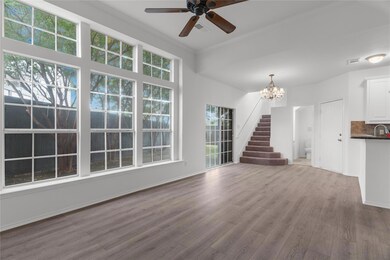 Unfurnished living room featuring hardwood / wood-