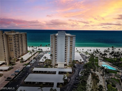 Aerial overview of property's location with expansive beach