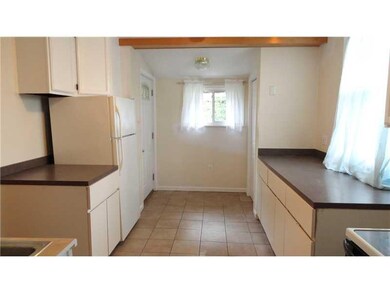 Kitchen. Bright sunny kitchen, ceramic tile floors