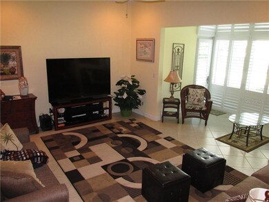 LIVING ROOM AND ENCLOSED LANAI