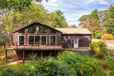 Front Facade of Home And Large Windows