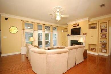 Family Room, windows to patio, fireplace with gas