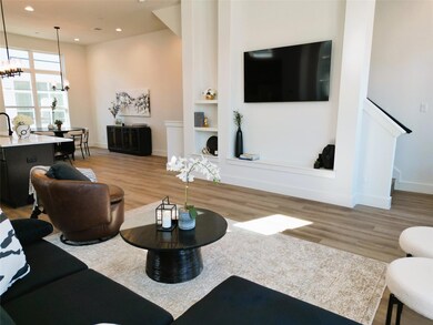 Living room featuring light hardwood / wood-style 