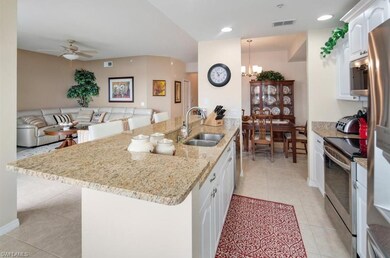 New Granite Counters w/ White Wood Cabinets