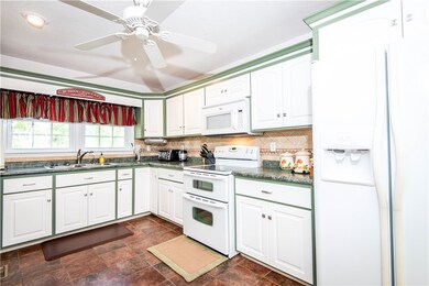 Well appointed bright kitchen with tons of storage