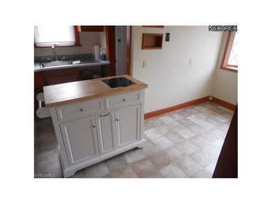 Spacious kitchen with island, microwave and new di