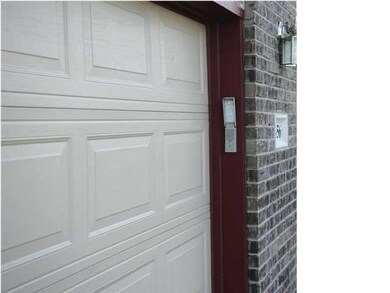 Key-pad above the basic garage entrance.