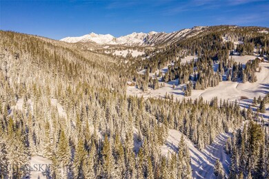 Aerial view over lot to Beehive Peak and Beehive B