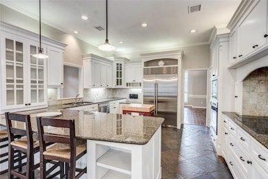 Well appointed kitchen with subzero fridge.