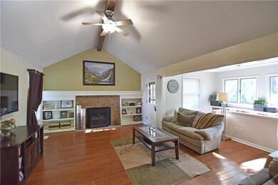 Spacious great room enhanced with gas-log fireplac
