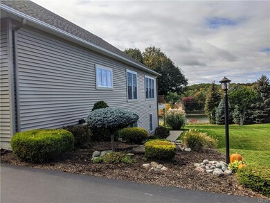 Beautifully landscaped lot wrapping around the ext